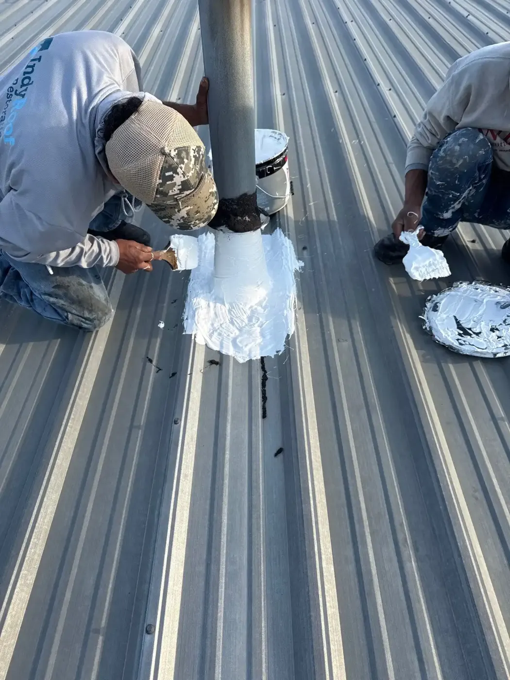 Tarping and dry-in on a Albion commercial roof